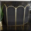 D07. Brass fireplace screen. 